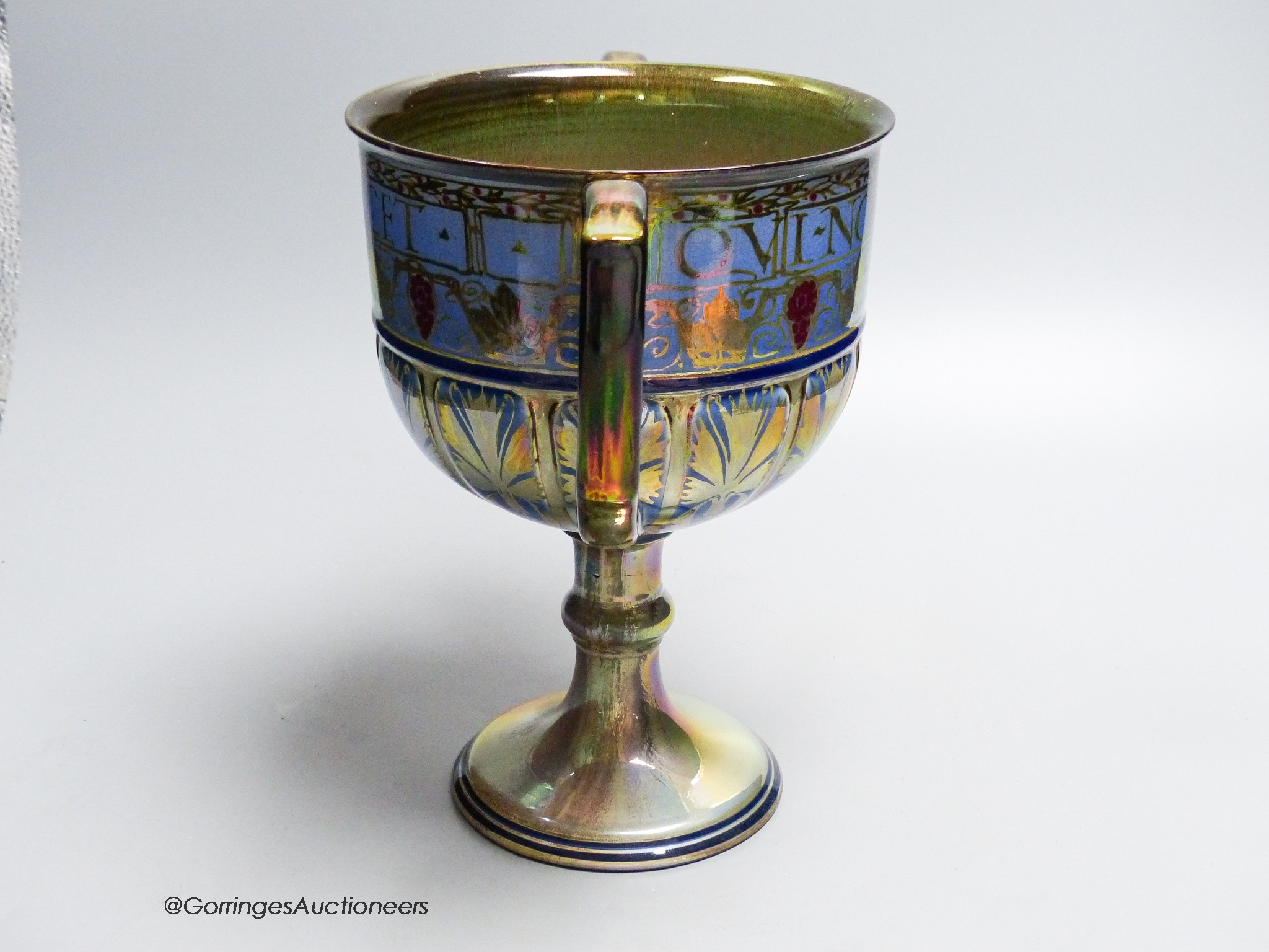 A Pilkingtons Royal Lancastrian lustre loving cup, monogram for Gordon M Forsyth, height 24cm (a.f.)